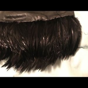 Cache skirt with feathered trim